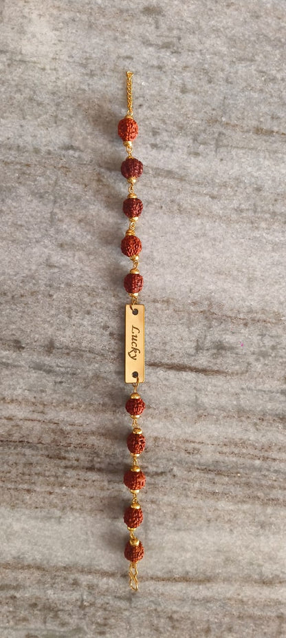 Customized Name Metal Engraved Rudraksha Rakhi – Personalized Raksha Bandhan Gift by ClickNGreet